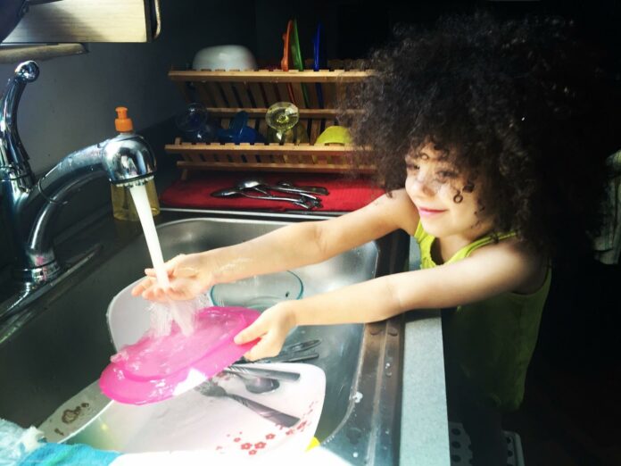 Kid doing chores Kid doing chores