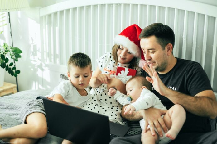 Happy family communicate with family via video chat. COVID, social distancing concept Happy family communicate with family via video chat. COVID, social distancing concept