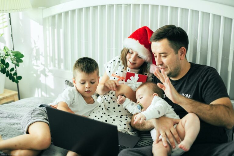 The Role of Family in Child Development Happy family communicate with family via video chat. COVID, social distancing concept