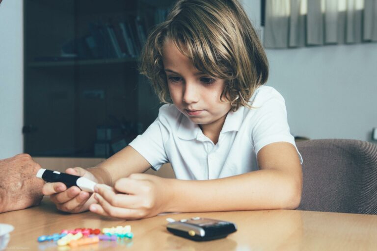 Natural Ways to Control Diabetes Natural Ways to Control Diabetes, Diabetic child makes a lancing