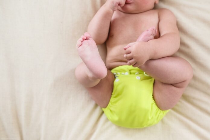 Baby in cloth diaper Baby in cloth diaper