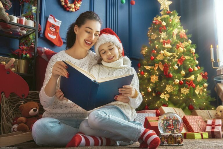 mother reading a book at Christmas